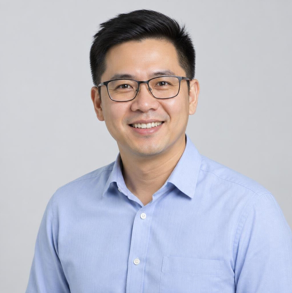 Studio portrait of a Malaysian Chinese man systems researcher