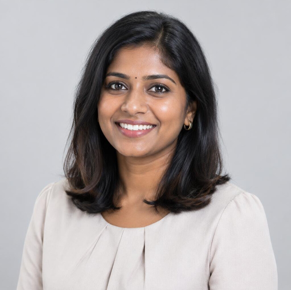 Studio portrait of a Malaysian Indian woman technical writer